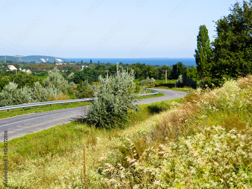 Asphalt road on summer day