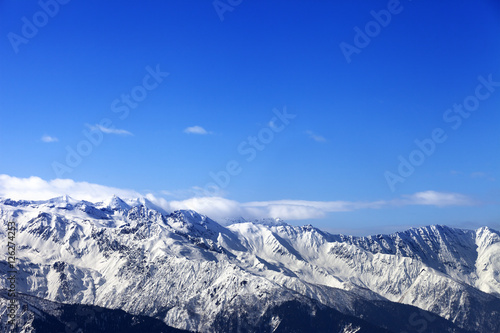 Sunlight snowy mountains at winter sun day © BSANI