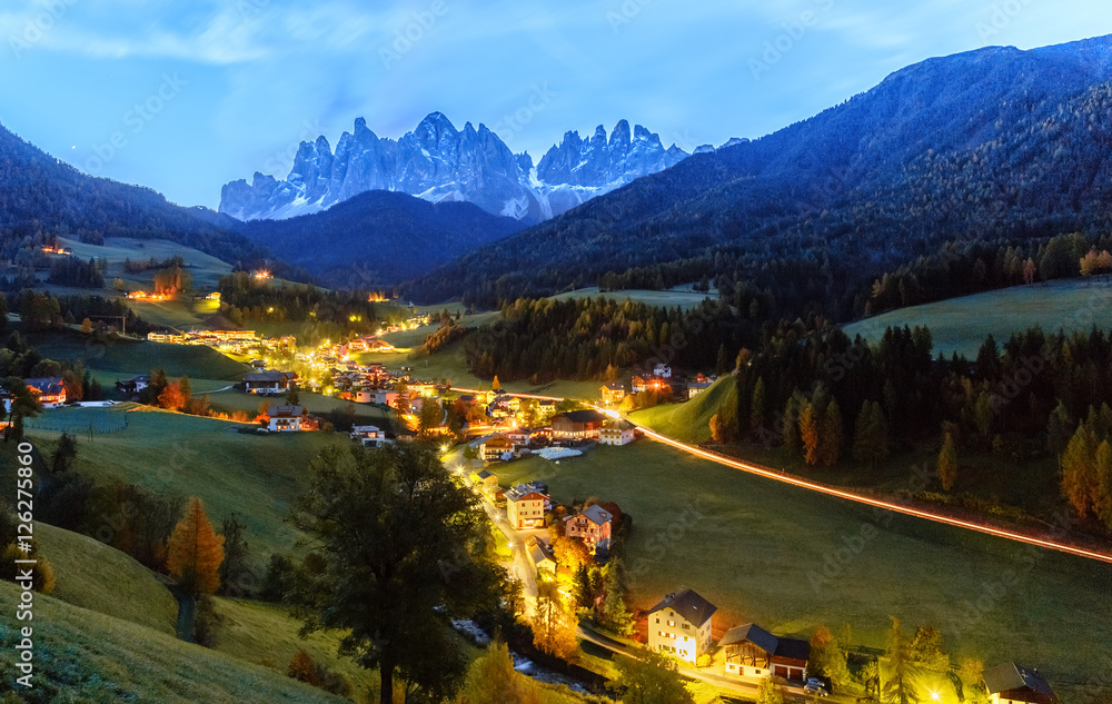 Santa Maddalena village, night scene, Dolomites mountains on background. Italy, South Tyrol.