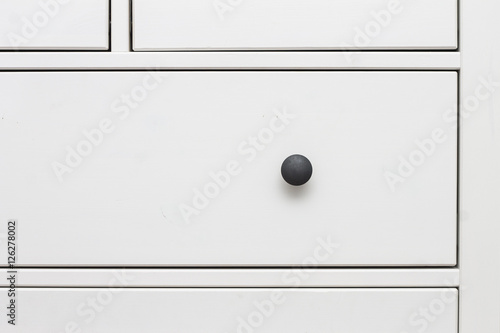 white wooden chest of drawers