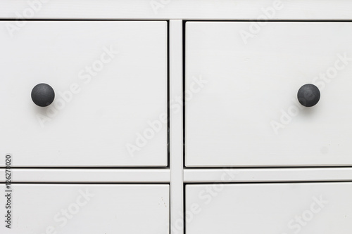 white wooden chest of drawers