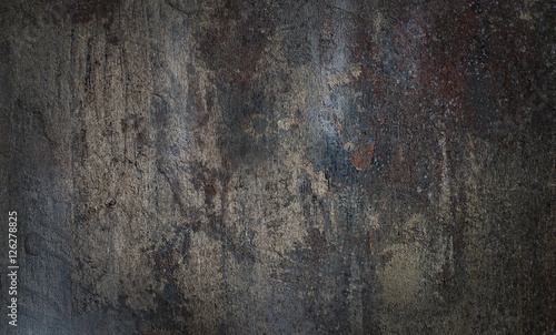 Grey stone background with an uneven texture.