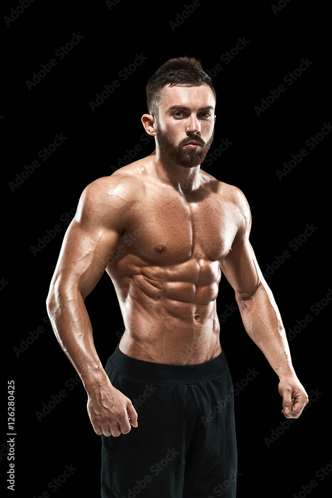 Muscular bodybuilder guy doing posing Muscular bodybuilder guy doing posing