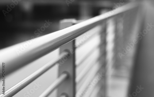 Black and white steel border fence background 