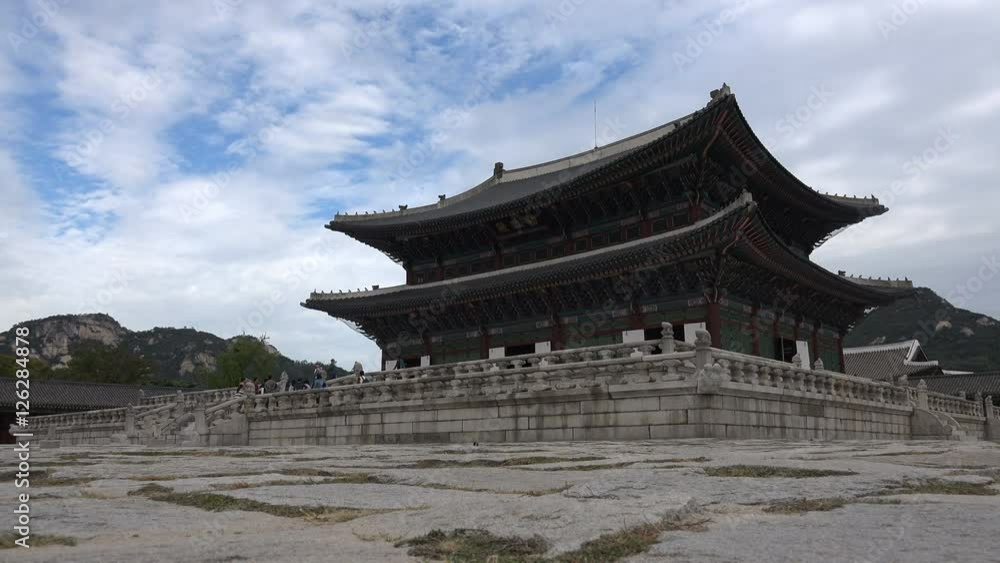 Time lapse of clouds moving over the historic Gyeongbokgung royal palace in Seoul, South Korea Time lapse of clouds moving over the historic Gyeongbokgung royal palace in Seoul, South Korea