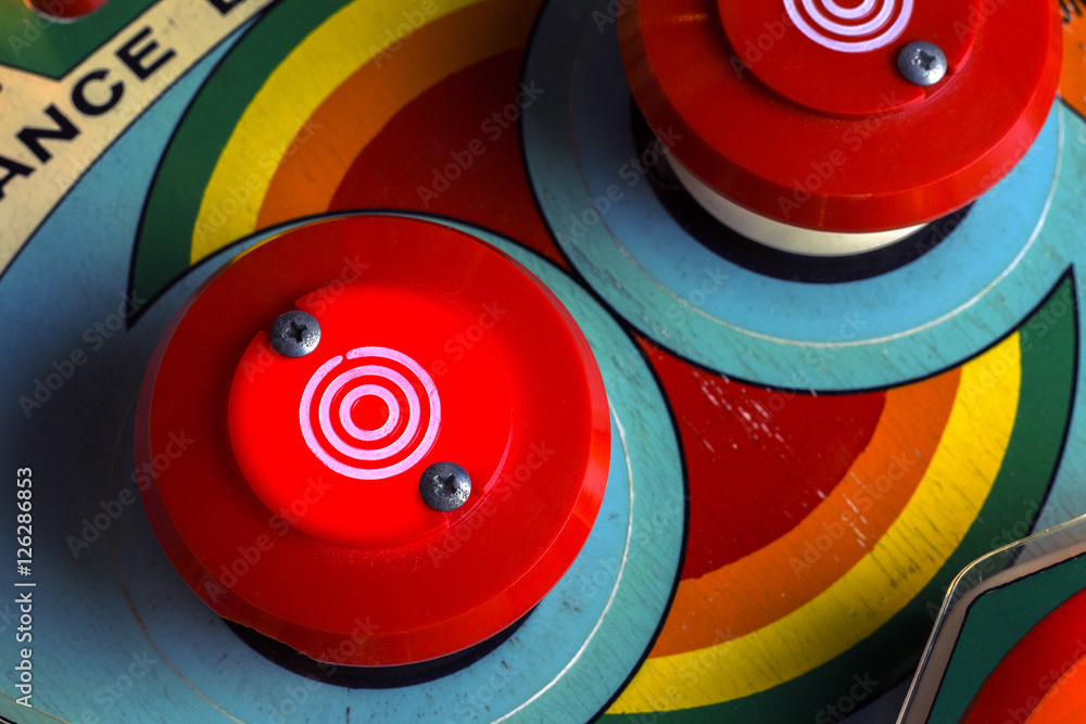 Fototapeta premium Red bumpers on a retro pinball machine