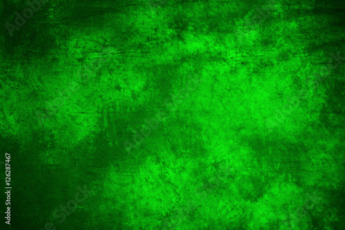 green fabric artistic background with simulated blurred ink.