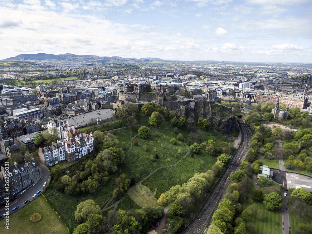 Edinburgh city historic Castle Rock sunny Day Aerial shot 4