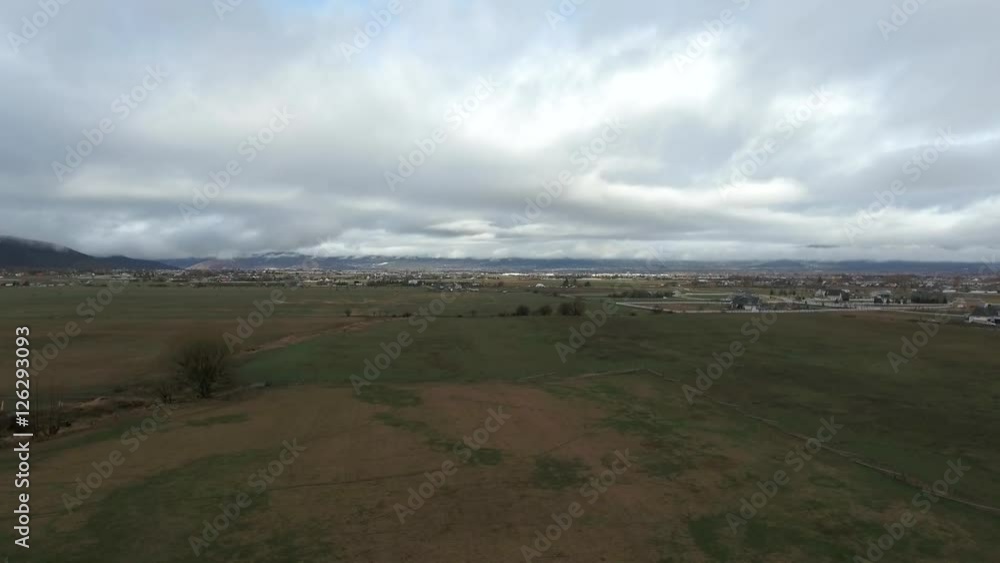 An aerial shot of a beautiful mountain valley and fields An aerial shot of a beautiful mountain valley and fields