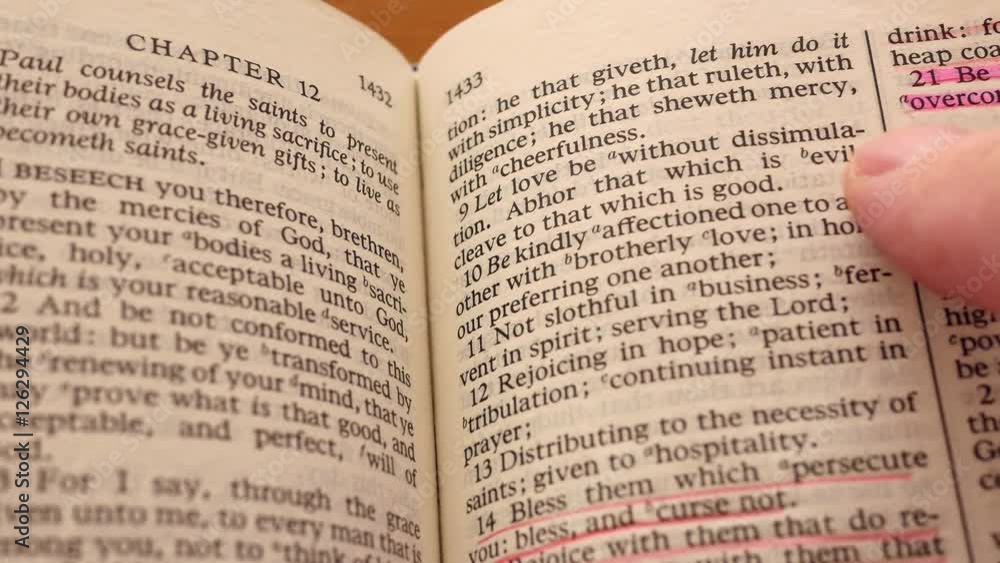 A closeup dolly shot of man reading bible abhor evil A closeup dolly shot of man reading bible abhor evil