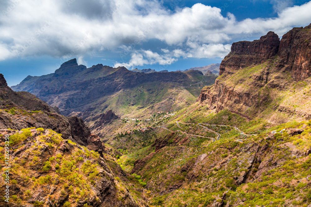 Masca valley.Canary island.Tenerife.Scenic mountain landscape.Teide volcano and sunset valley panorama in Tenerife.Scenery valley in Spain.Nature and travel adventures and breaks the world