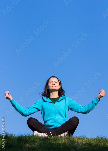 Woman doing yoga exercises