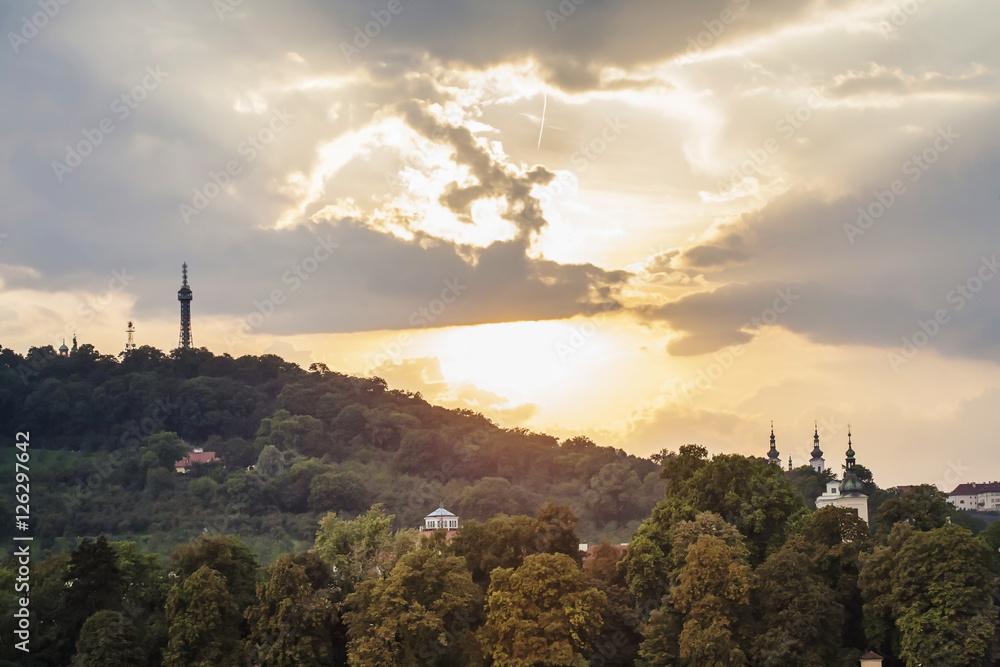 View on Petrin hill with Petrin lookout tower with beautiful sun