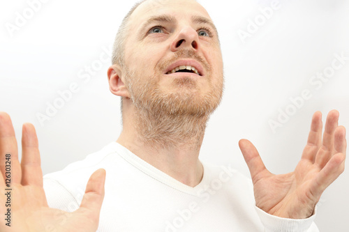 portrait of adult happy man on a white background