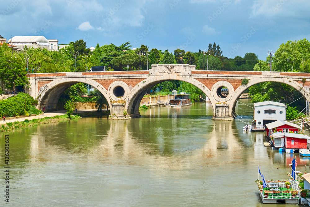 Beautiful bridge over the tiber in Rome
