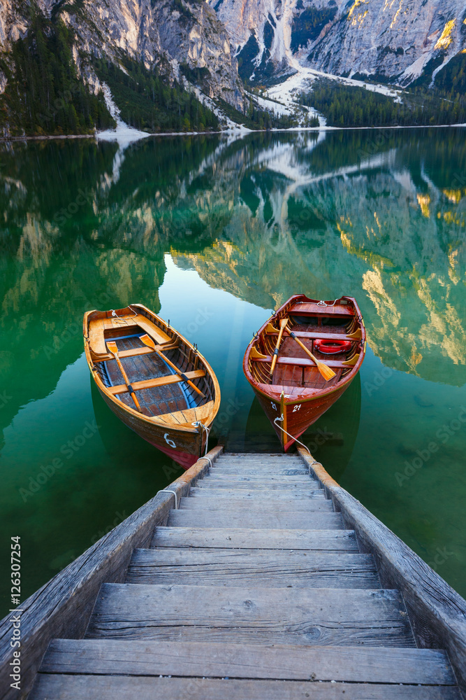 Fototapeta premium Boats on the Braies Lake ( Pragser Wildsee ) in Dolomites mounta