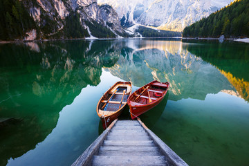 Glasbilder Natur Boats on the Braies Lake ( Pragser Wildsee ) in Dolomites mounta  © Kavita