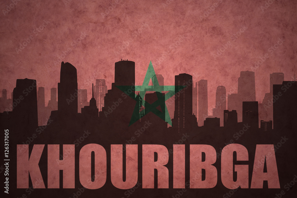 abstract silhouette of the city with text Khouribga at the vintage moroccan flag abstract silhouette of the city with text Khouribga at the vintage moroccan flag