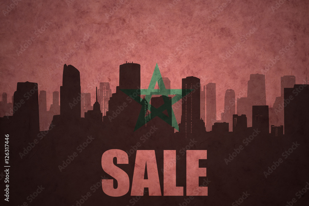 abstract silhouette of the city with text Sale at the vintage moroccan flag