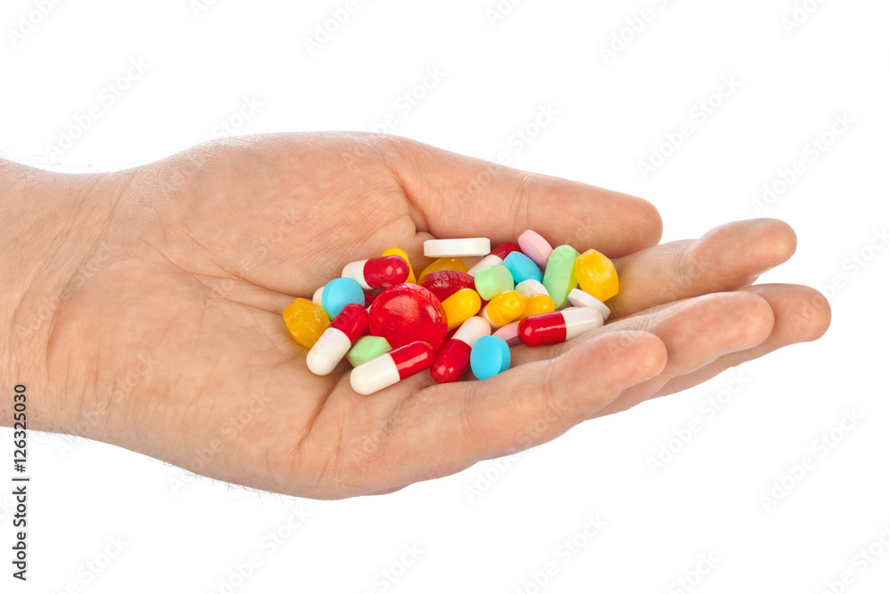 Hand with pills Hand with pills