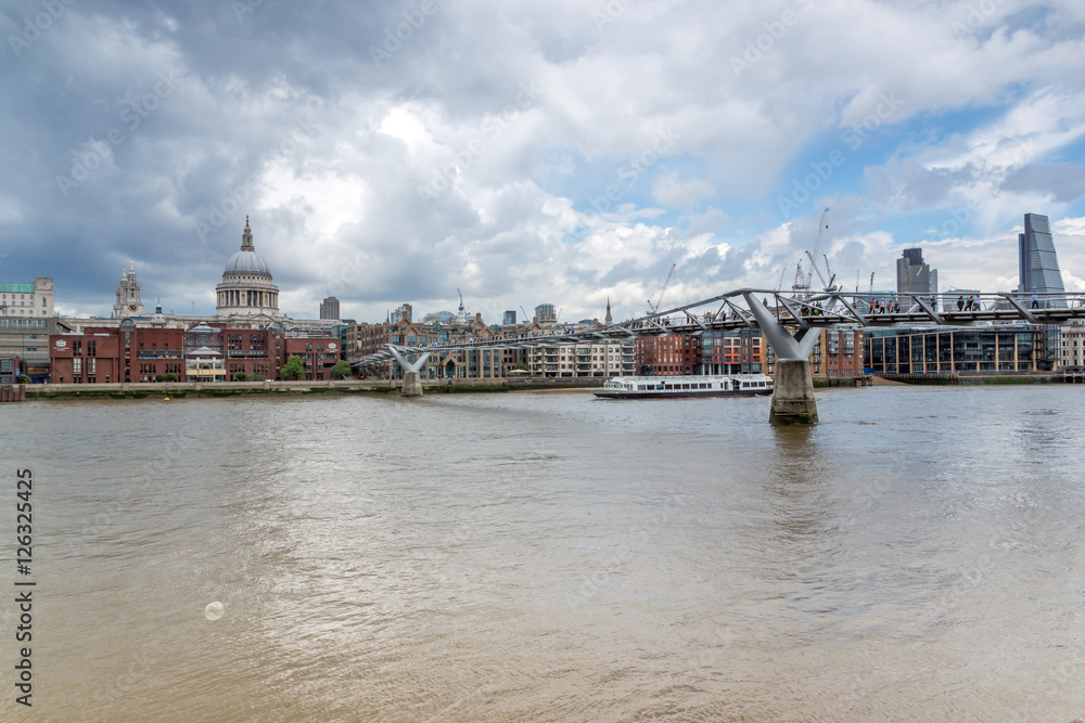 LONDON, ENGLAND - JUNE 15 2016: Panorama with St. Paul's Cathedral and Millennium bridge, London, England, Great Britain