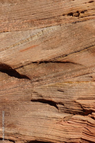 Detail, cross current layers of red sandstone photo