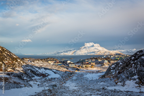 Daylight view to the distant suburb of Nuuk, Sermitsiaq mountain