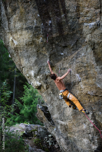 Extreme sport climbing. Rock climber struggle for success. Outdoor lifestyle.