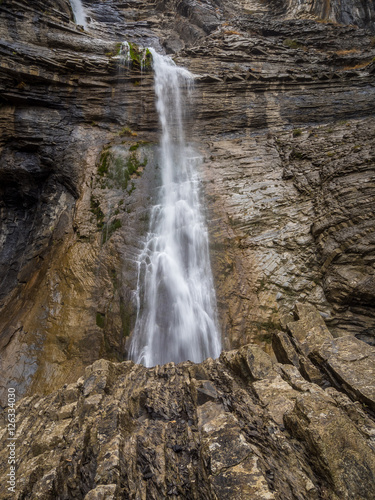 Waterfall in a rugged cliff © ramoncarretero