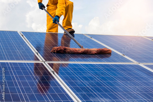engineering man clean of solar cell concept.	