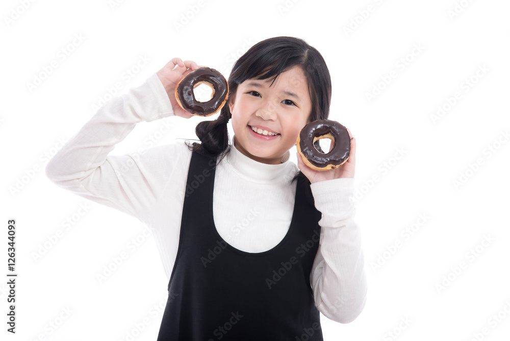 Fototapeta premium Asian girl eating chocolate donut