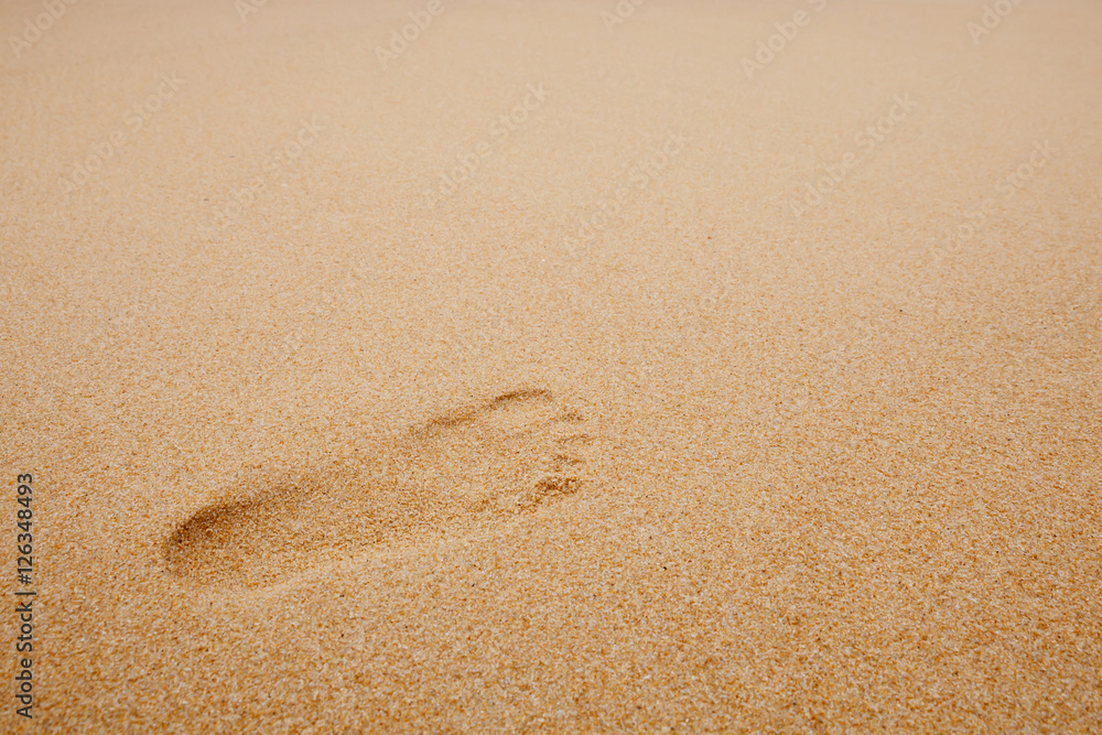Footprints on sand beach Footprints on sand beach
