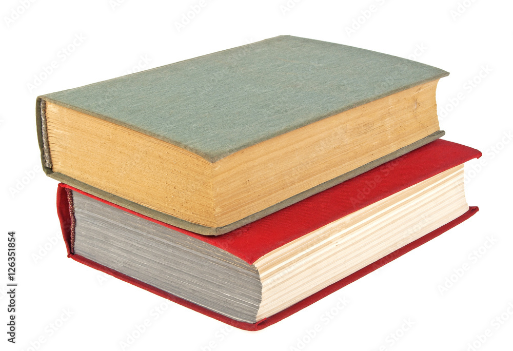 Closed old books isolated on white background