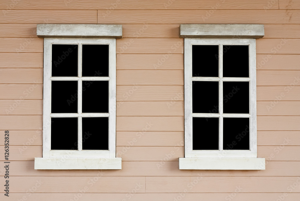 dual or two old wood white window with black screen on the wall