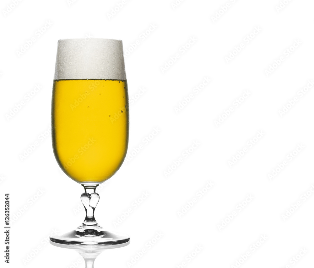 front view frosty lager light beer in wineglass with white bubbl front view frosty lager light beer in wineglass with white bubbl