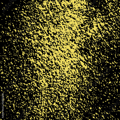yellow paint splashes on black background. Gold. Grunge texture.
