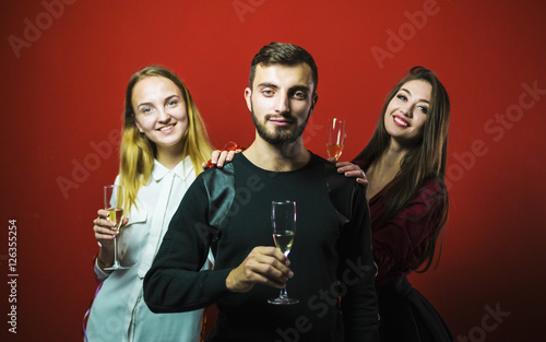 Friends on a New Year party have fun, friendly celebration