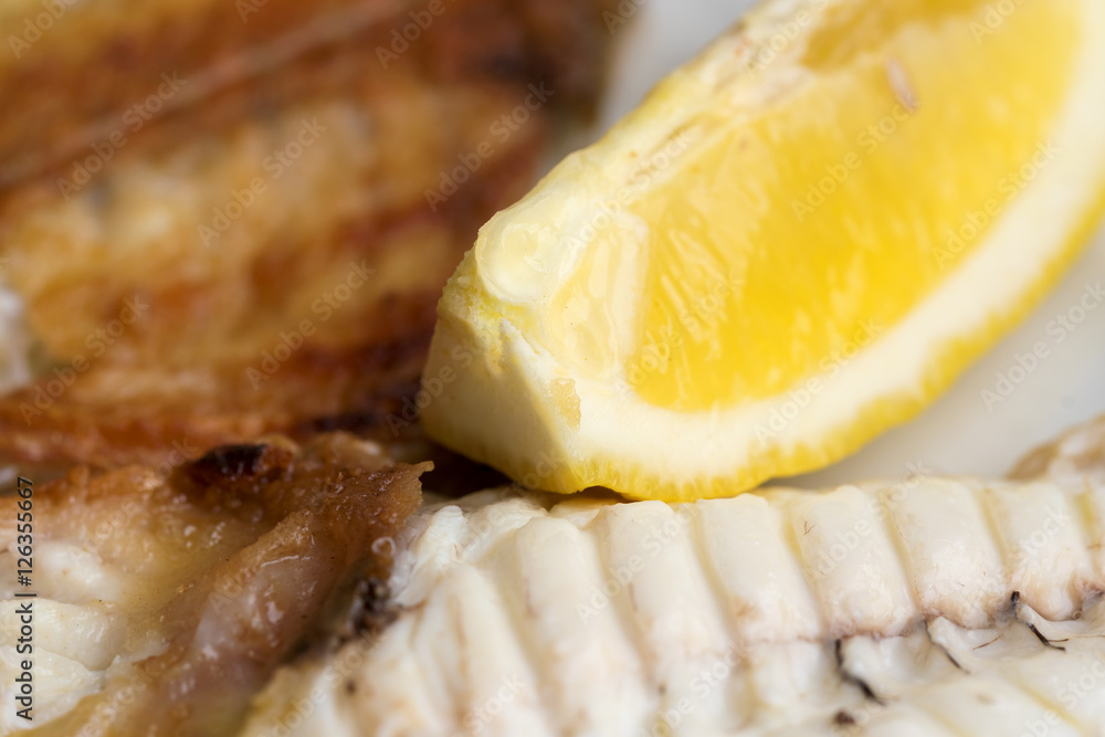 Fried fish with a lemon Fried fish with a lemon