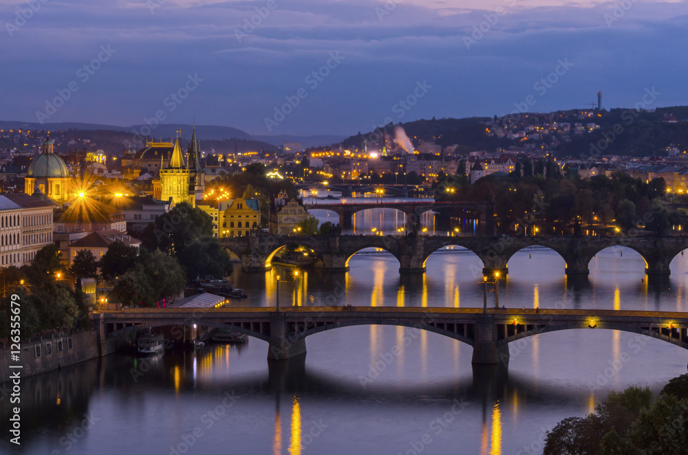 Fototapeta premium Evening view on Charles bridge over Vltava river in Prague,capit