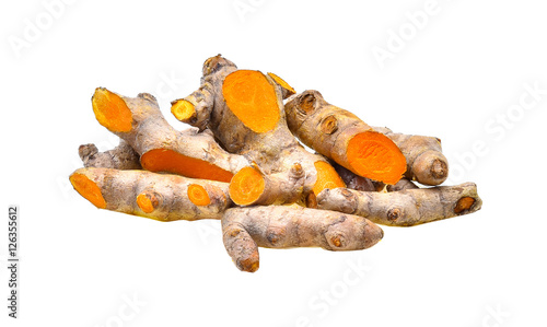 fresh turmeric roots on white background