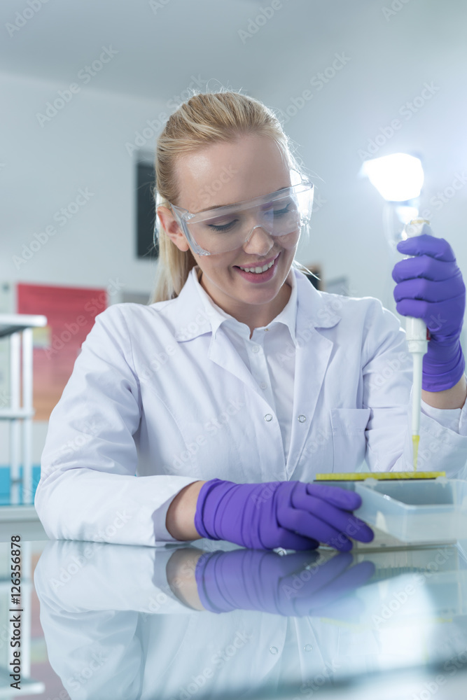 Fototapeta premium laboratory assistant analyzing a sample