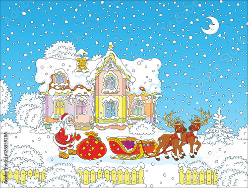 The night before Christmas, Santa Claus with a big bag of gifts preparing for a journey in his sleigh with reindeers