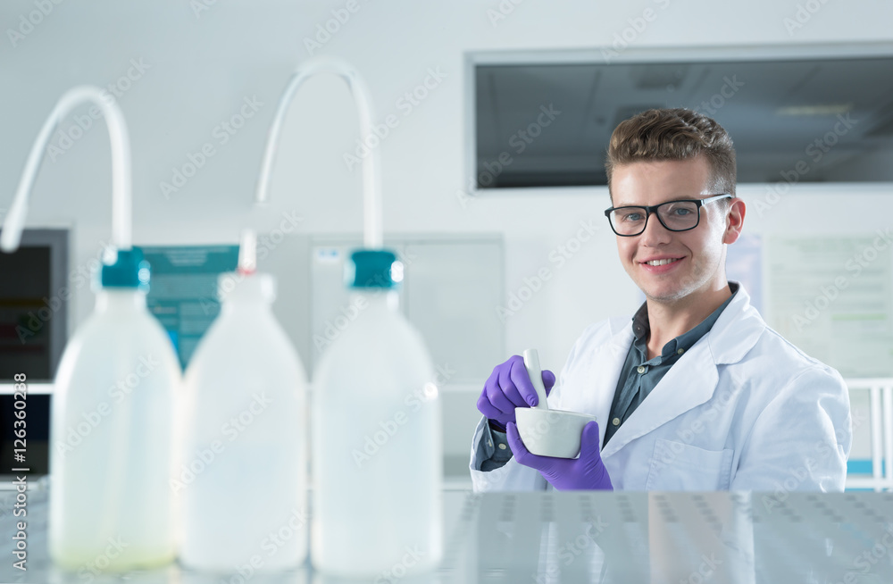 young doctor scientist in bright labaratory work research and an young doctor scientist in bright labaratory work research and an