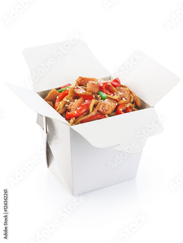 Chinese food. Noodles with fried chicken and vegetables isolated