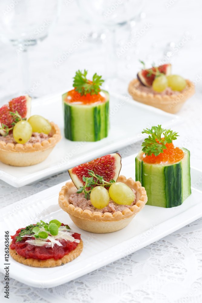 Set of festive mini appetizers, vertical Set of festive mini appetizers, vertical