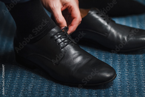 Men's Classic Black Leather Shoes on the floor