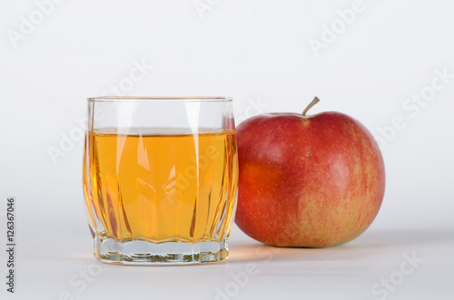 Apple with glass of juice