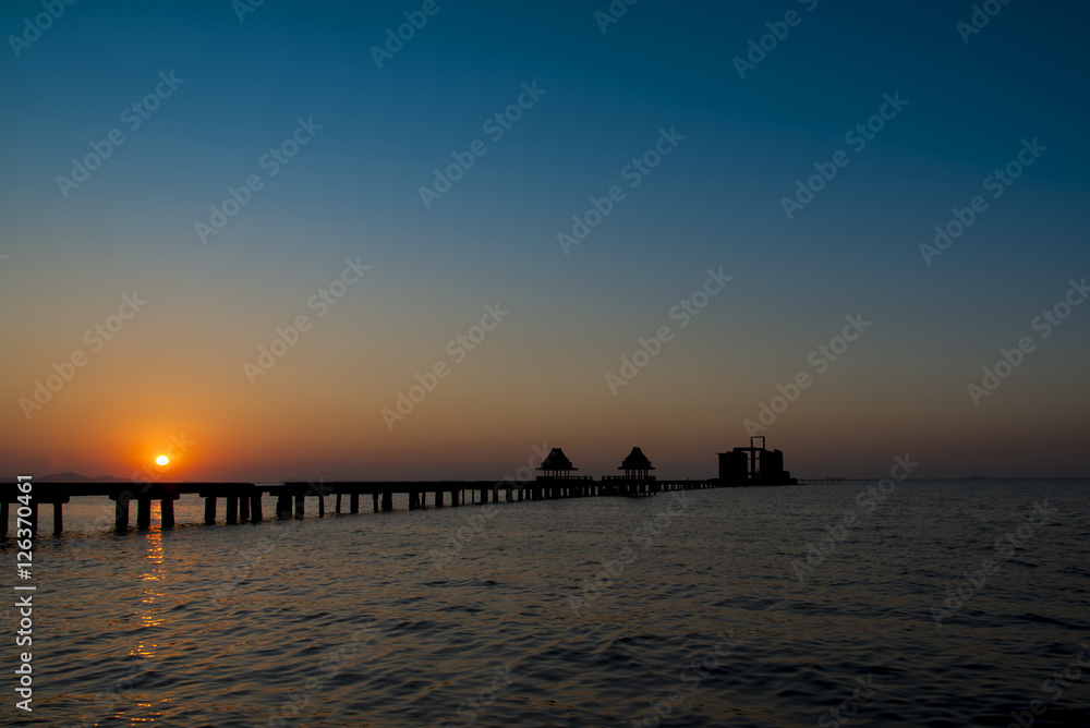 Sunset with sea and long bridge, thailand