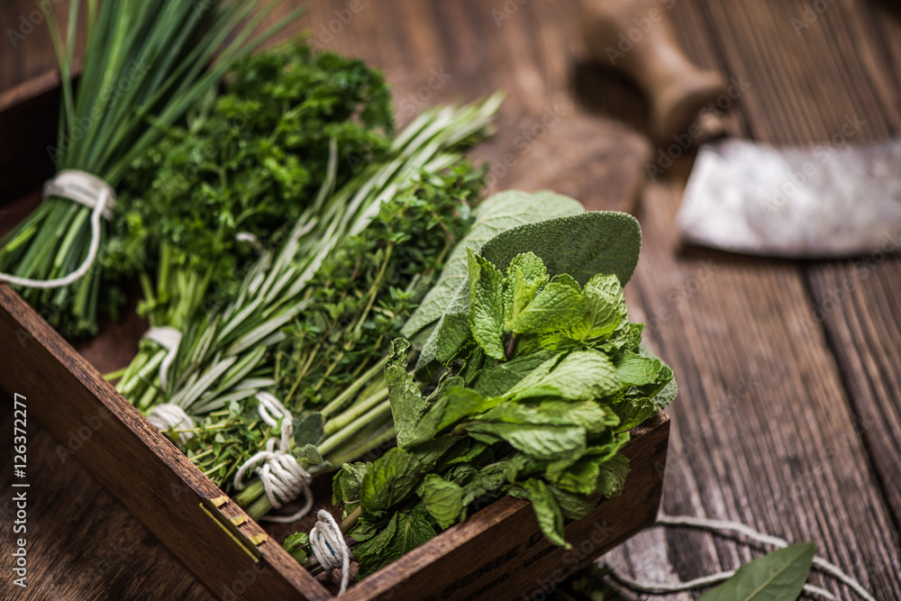fresh aromatic herbs on kitchen table - obrazy, fototapety, plakaty 