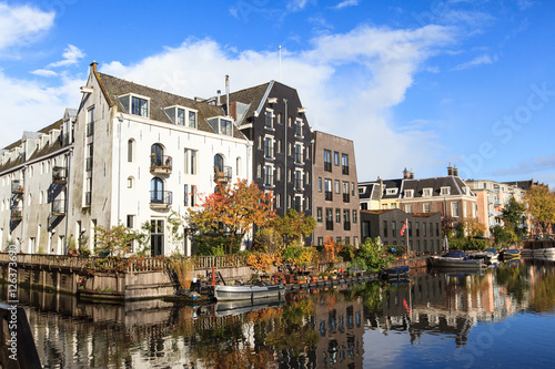 Photography Beautiful view of canals in autumn sunny day,  Amsterdam, Netherlands